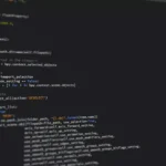 Best AI Tools for YouTube Creators: Edit, Script, and Grow Your Channel in 2026 Close-up view of Python code on a computer screen, reflecting software development and programming.